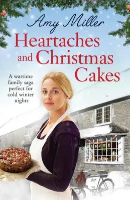 Chagrins d'amour et gâteaux de Noël : Une saga familiale en temps de guerre, parfaite pour les froides nuits d'hiver - Heartaches and Christmas Cakes: A wartime family saga perfect for cold winter nights